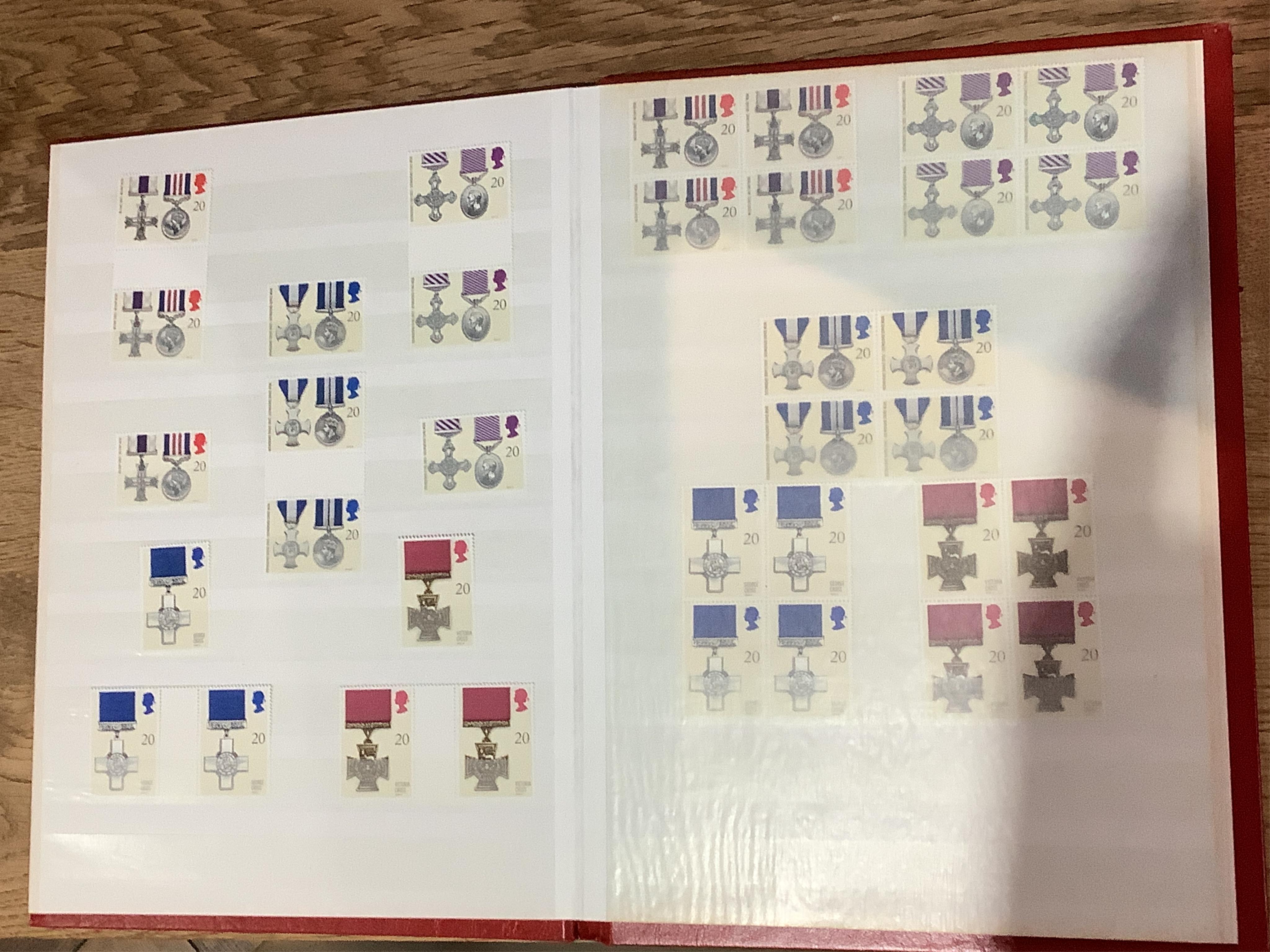 A collection of assorted stamps relating to coins and medals in four stock books. Condition - fair to good